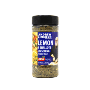 Bottle of Andrew Zimmern Lemon & Shallots Seasoning with a black cap and blue label showing chef image and lemon graphics