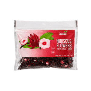 Bag of Badia Hibiscus Flowers tea with red label and hibiscus illustration on a pink background