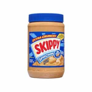 Jar of Skippy Extra Crunchy Peanut Butter with blue lid and label visible